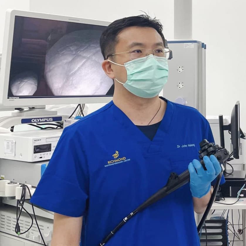 Dr John Hsiang performing a gastroscopy and colonoscopy procedure