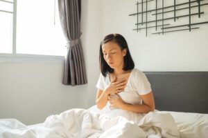 Woman with acid reflux