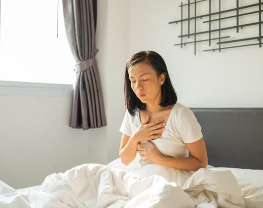 Woman with acid reflux