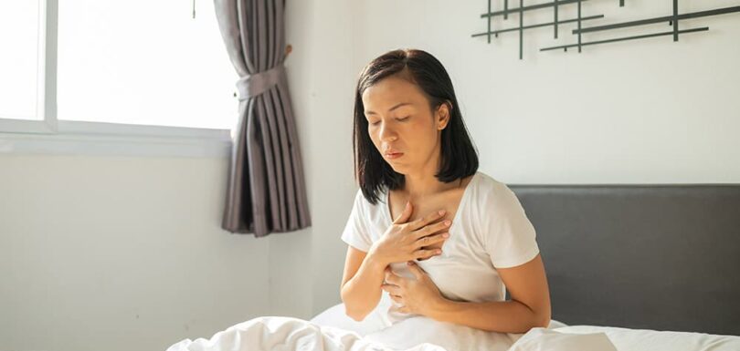 Woman with acid reflux
